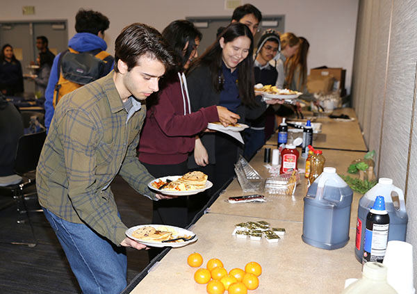 Students loaded up on pancakes at the Dean’s Breakfast.