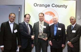 Payam Heydari (center) with officers of the Orange County Engineering Council